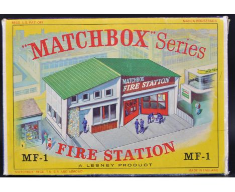 An original vintage Lesney made Matchbox Series boxed Fire Engine model No. MF-1. Plastic construction with original sticker 