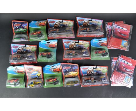 A large collection of Mattel made Disney Pixar ' Cars 2 ' diecast and plastic model to include; x10 Mater &amp; Zen sets, Tow