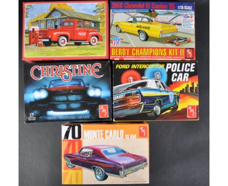 A collection of x5 assorted AMT 1/25 scale plastic model kits to include; 788/12 Ford Interceptor Police Car, 1144M/12 Coca C