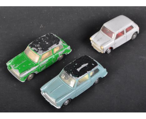 Three original vintage Triang made Spot-On 1/42 scale diecast model cars comprising; x2 Austin A40 and an Austin Seven. Model