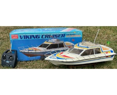 A vintage Academy 1/20 scale RC Radio Control Viking Cruiser 540 Baltic model boat. The boat appearing to have all radio gear