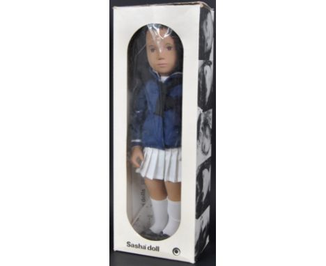 An original vintage circa 1970's vinyl Sasha doll No. 102S ' Sasha Brunette Marina ' with box. The doll having dark brown roo