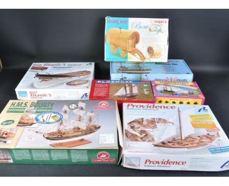 A collection of x6 assorted wooden model kits to include; 1/35 scale RMS Titanic Lifeboat, 1/25 scale Providence Whaleboat, M