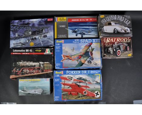 A collection of assorted plastic model kits of various scales and makers to include; Revell 1/28 scale WWI Fighter, Italeri 1