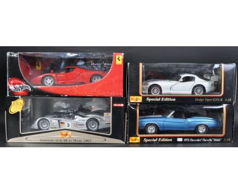 A collection of x4 assorted 1/18 scale diecast model cars comprising; Mattel Hot Wheels Ferrari, Maisto Dodge Viper GTS-R, Ma