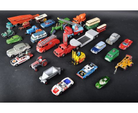 A collection of assorted vintage diecast model cars, trucks, buses and other vehicles by various makers to include Dinky Toys