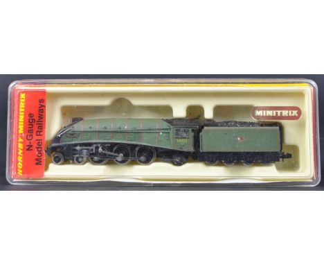 An original Hornby Minitrix N gauge model railway trainset locomotive engine No. 211 Mallard 60022 in British Railways green.