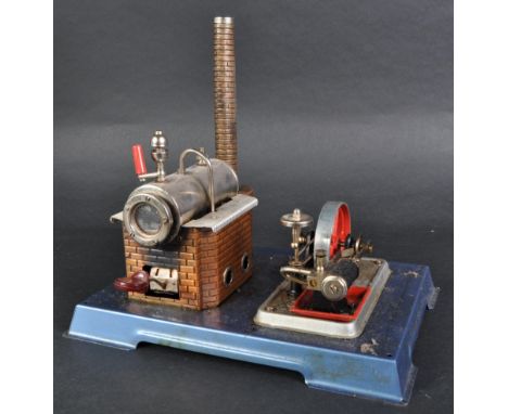 An original vintage German Wilesco made live steam stationary engine model No. D10. Horizonal mounted boiler with chimney and