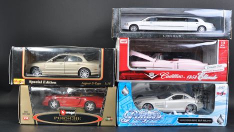 A collection of x5 assorted 1/18 scale boxed diecast model cars to include; Burago Porsche 911 Turbo, Masito Jaguar S-Type, A