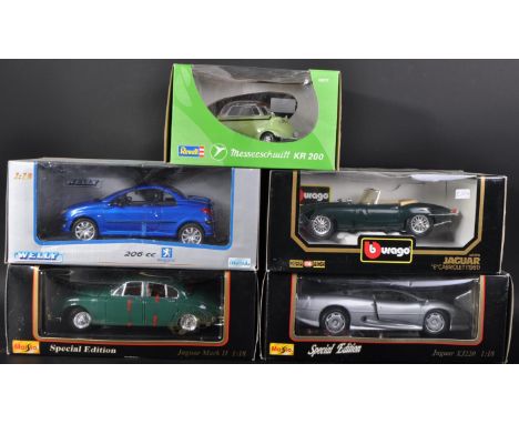 A collection of 5 large scale boxed diecast model cars by makers Maisto, Burago, Revell, Anson and Welly. Examples comprising