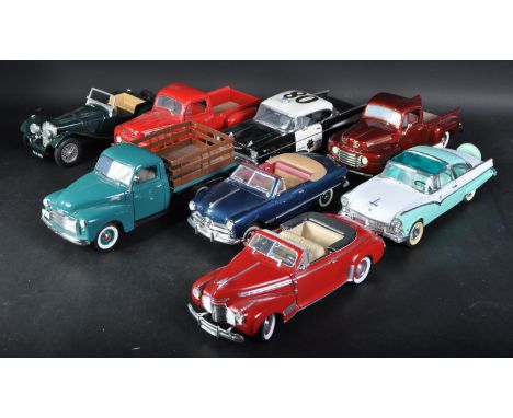 A collection of assorted 1/18 scale diecast model cars by various makers to include; Universal Hobbies, Road Signature, Mira 