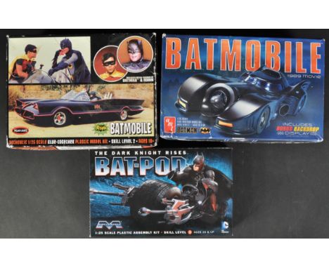 A collection of x3 Batman Batmobile and Batpod 1/25 scale plastic model kits by makers AMT, Polar Lights and Moebius Models. 