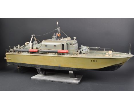 A large scale scratch built hand made Royal Navy motor torpedo patrol boat. The model of wooden construction with naval artil