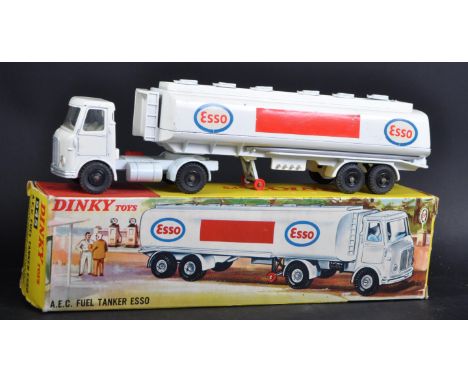 An original vintage Dinky Toys boxed diecast model No. 945 ' AEC Fuel Tanker Esso '. The model with detachable tank, x6 openi