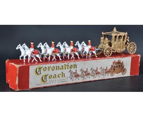 An original vintage Lesney made Queen Elizabeth Coronation Coach. The lead diecast model with eight horses and affixed lead r