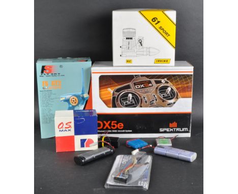 A collection of assorted RC Radio Control transmitters and radio gear parts to include; Fly-Sky FS-GT2 control system, Spektr