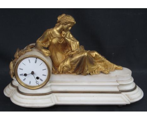 19TH CENTURY ORMOLU AND WHITE MARBLE TWO TRAIN FIGURAL MANTEL CLOCK, the case surmounted by a reclining pensive female figure