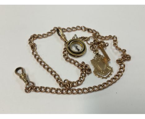 A 9ct gold Albert chain together with a 9ct T bar and compass fob. 37.5G.