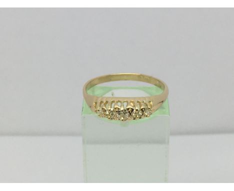 A circa 1930s 18ct gold ring set with five diamonds, approx 2.5g and approx size P-Q.