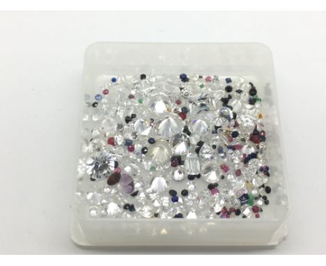 A collection of loose mixed stones including Cubic Zirconia, ruby, sapphire, amethyst, garnet, emerald and citrine, approx 98