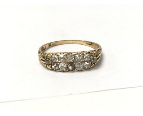 An 18ct gold ring approximately size V with old cut diamonds.