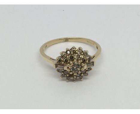 A 9ct gold diamond cluster ring set with champagne coloured diamonds, approx 1ct, approx 2.6g and approx size P-Q.