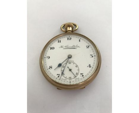 A 9 ct gold button wind pocket watch the circular dial with Arabic numerals and second subsidiary dial .