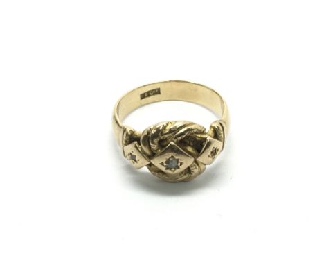 An 18ct gold ring set with diamonds, missing stone, approx 5g and approx size J.