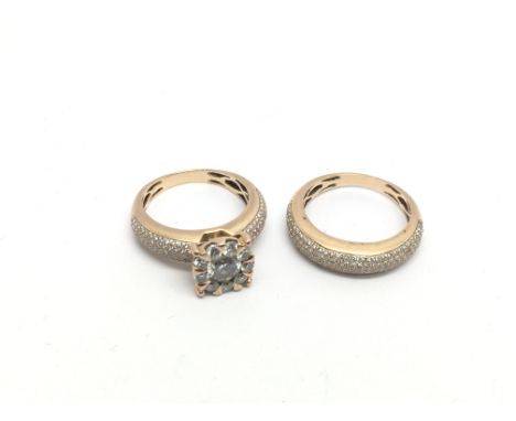 Two gold rings comprising a diamond cluster example and a matching engagement ring, approx total weight 9.4g and approx sizes