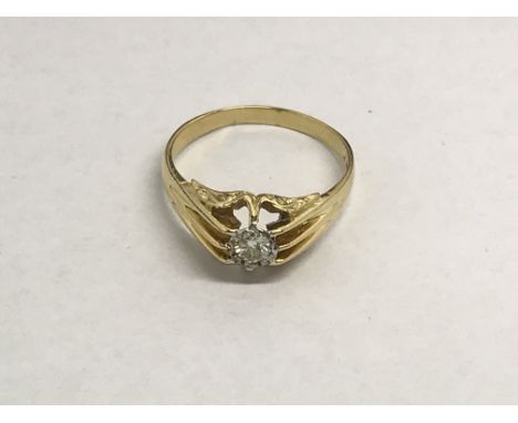 A gents 18ct gold gypsy ring, approx .20ct, approx 5.3g and approx size T.