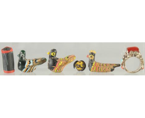 FOUR ISLAMIC GLASS PIECES, together with a ring and a cylindrical bead, (6).