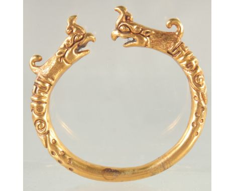 A CHINESE GILT METAL BRACELET.