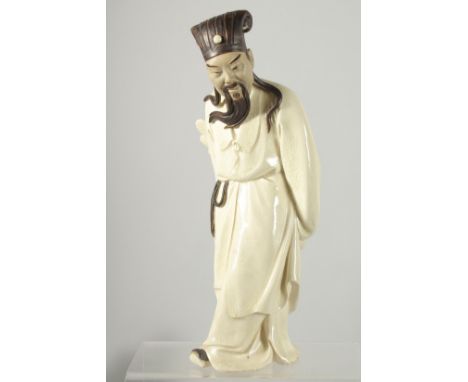 A LARGE CHINESE SHIWAN GLAZED POTTERY FIGURE, 29cm high.