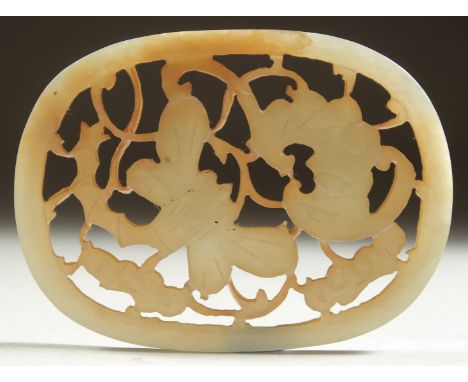 AN 18TH CENTURY CARVED AND PIERCED JADE AMULET, with bat and butterfly, together with a fitted wooden stand, jade 6.5cm x 5cm