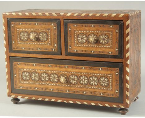 A RARE 16TH CENTURY NASRID OR POST NASRID ANDALUSIAN SPANISH IVORY AND BONE INLAID WOODEN TABLE CABINET, with three fine parq