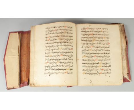 AN ISLAMIC NORTH AFRICAN LEATHER-BOUND MANUSCRIPT, 24.5cm x 19cm.