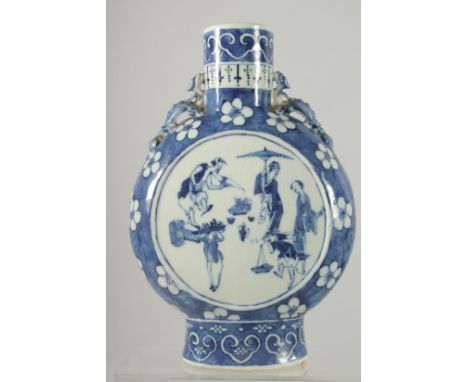 A CHINESE BLUE AND WHITE PORCELAIN MOON FLASK, with moulded chilong handles to the shoulders, each side painted with a panel 