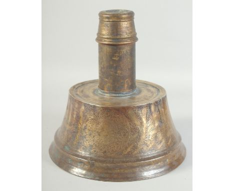 A RARE LARGE 14TH-15TH CENTURY MAMLUK ENGRAVED BRASS CANDLESTICK BASE with later wooden top, engraved with calligraphy and fo