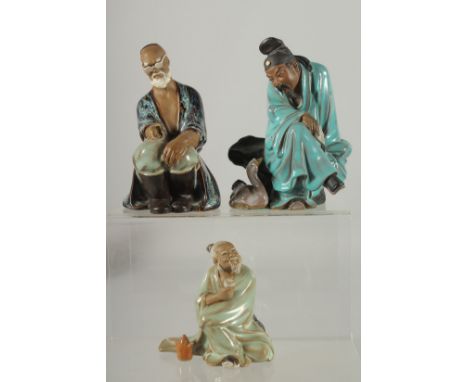 THREE CHINESE SHIWAN GLAZED POTTERY FIGURES, (two with loss), various sizes, (3).