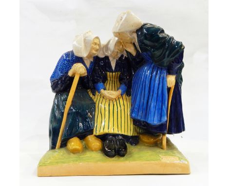 Henriot Quimper France ceramic group of three women, two seated, one standing, in traditional dress and clogs, 39cm high 
