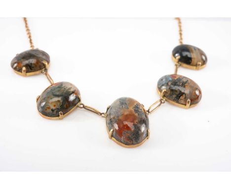 9CT GOLD BELIEVED MOSS AGATE NECKLACE, of graduated cabochon design, 10.2gmsProvenance: private collection CeredigionComments