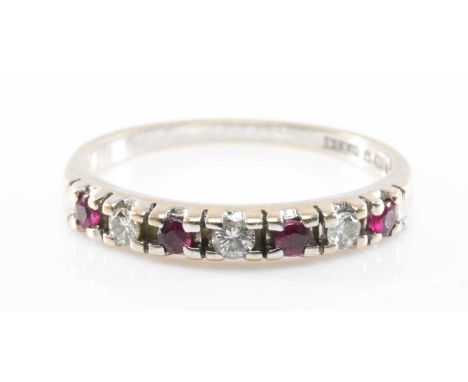 RUBY & DIAMOND 7-STONE HALF HOOP RING, set in 9ct yellow gold plain shank, sponsor's mark DS&Co., gross weight 1.2gms, ring s