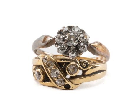 TWO 18CT GOLD DIAMOND RINGS comprising seven stone cluster and a scroll design ring, 6.4gms gross (2)Provenance: deceased est