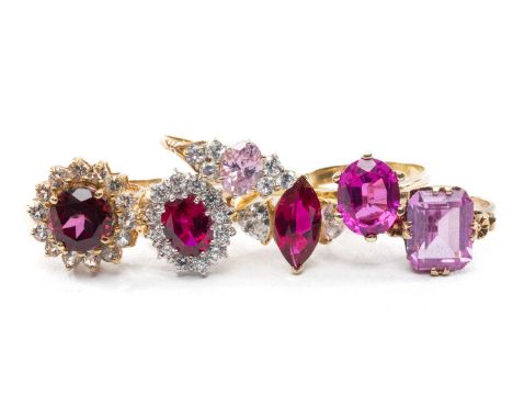 ASSORTED RUBY & PRESUMED PINK SAPPHIRE DRESS RINGS, including 9ct flower cluster, 15ct marquise & cz 3-stone, 9ct emerald cut