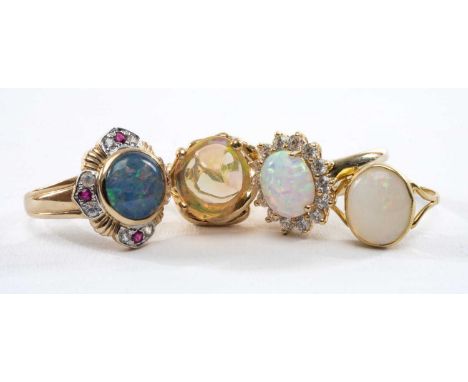 ASSORTED OPAL DRESS RINGS, in 9, 14 & 18ct settings, and including opal doublet, ruby and white sapphire ring, opal and cz cl
