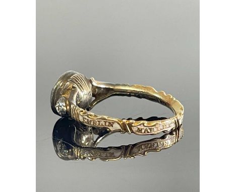 RARE 18TH CENTURY GOLD MOURNING RING, commemorating the death of two children, set with oval cut rock crystal and two rose cu
