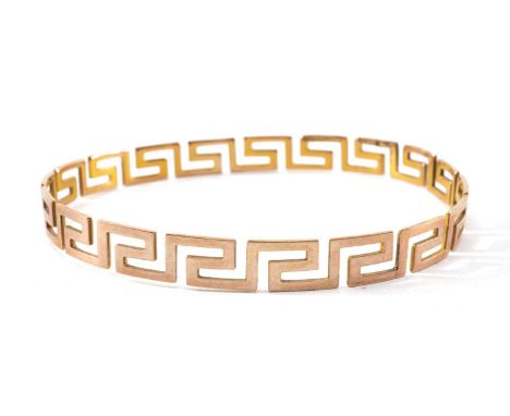 YELLOW METAL GREEK KEY CLOSED BANGLE, Rd No. 683943, stamped '9', 16.9gmsProvenance: private collection CeredigionComments: l