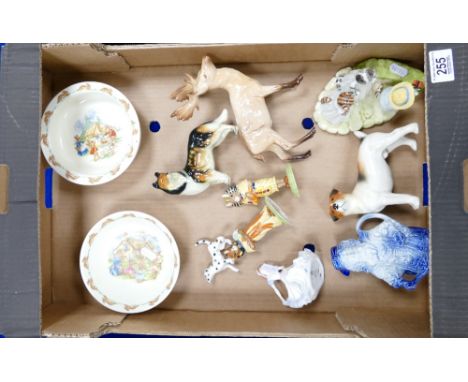 A mixed collection of items to include: Beswick Stag, Melba ware dogs, Royal Doulton Oatmeal bowl &amp; Anchesenamun &amp; Tu