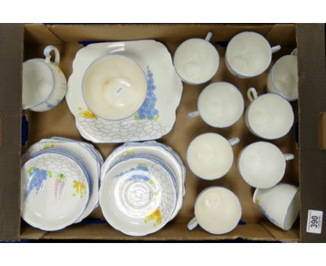 A collection of Grafton hand painted floral tea ware: 9 cups, 12 saucers etc