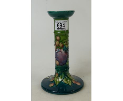 Moorcroft Finches and Berry design candlestick on green ground: height 21cm